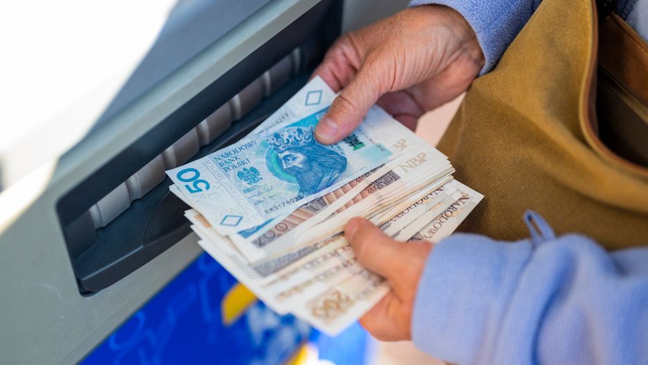 grandmother withdraws her pension at an ATM. A woman holds Polish money and zloty bills in her hands
payment, banknote, wealth, pensioner, hand, poverty, debit, paper, bills, holding, aged, customer, female, deposit, woman, elderly, retired, grandmother, finance, money, cash, credit, currency, bank, banking, financial, loan, withdraw, card, account, debt, machine, old, atm, pay, pension, queue, paycheck, bankrupt, borrow, exposure, economics, breakup, grexit, crete, people, control
