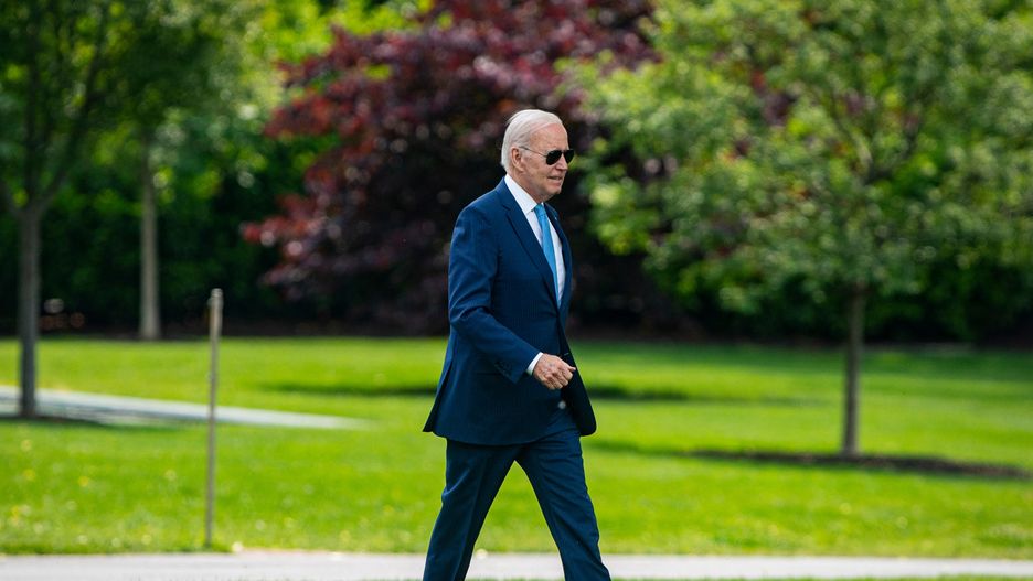 US President Joe Biden walks on the South Lawn of the White House before boarding Marine One in Washington, DC, US, on Wednesday, May 17, 2023. Biden is scrapping planned stops in Australia and Papua New Guinea following his trip to Japan for the Group of Seven meeting to return for continuing negotiations with Republicans over raising the debt ceiling. Photographer: Al Drago/Bloomberg via Getty Images