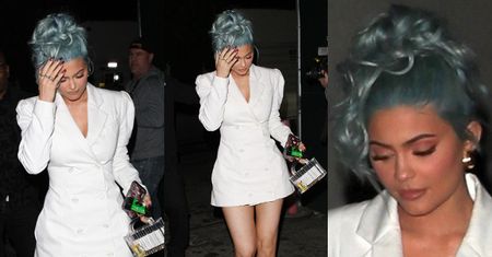 Niebieskowłosa Kylie Jenner zmierza na imprezę sylwestrową w białej marynarko-sukience