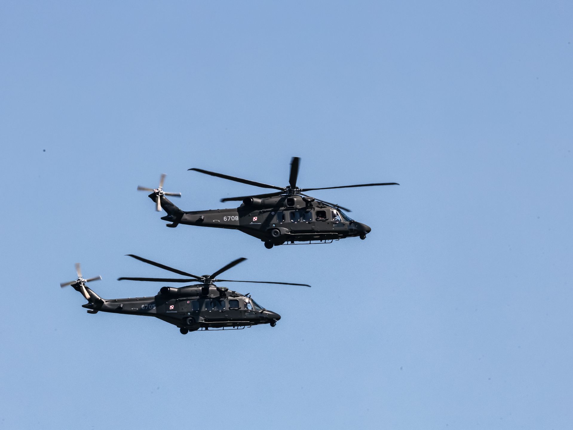 WARSAW, MAZOWIECKIE, POLAND - 2025/08/15: Helicopters AgustaWestland AW149 by Italian company Leonardo flies during the Polish Army Day Parade on Wislostrada in Warsaw. Poland marked Army Day with a grand military parade along Warsaw's Wisostrada, showcasing troops, equipment, and national pride in honor of its armed forces, as the NATO eastern flank country pushes to raise its military spending to 5% of GDP. (Photo by Dominika Zarzycka/SOPA Images/LightRocket via Getty Images)