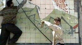 Portret Saddama w Mosulu (fot. AFP)