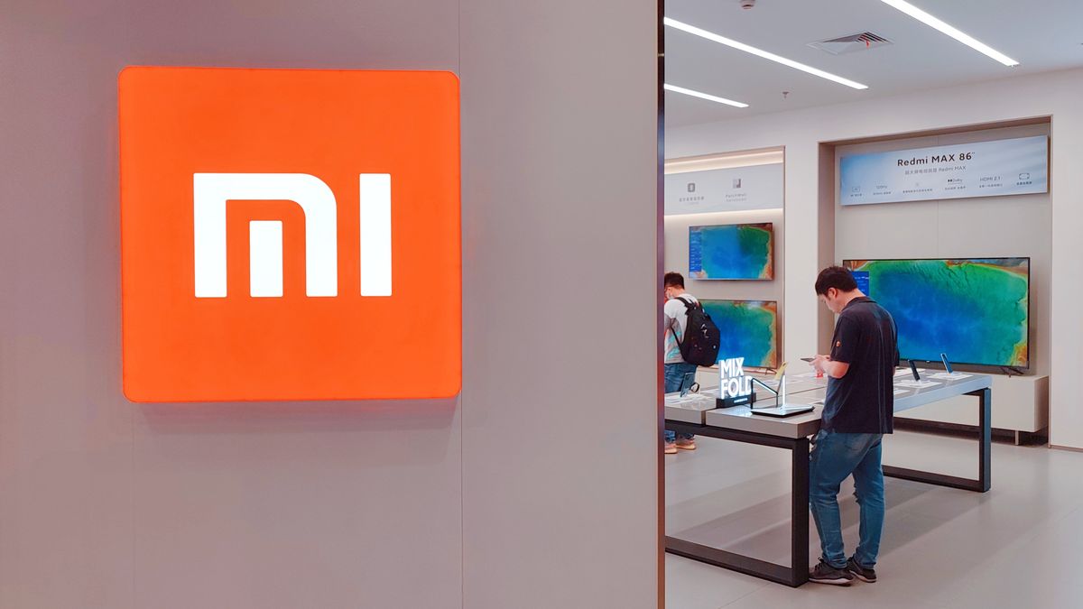 SHANGHAI, CHINA - MAY 11, 2021 - Photo taken on May 11, 2021 shows the newly launched Mi's first Mix foldable smartphone and Redmi K40 at the store in Shanghai, China. On May 26, 2021, Xiaomi Group announced that its total revenue in the first quarter of 2021 was 76.9 billion yuan, up 54.7% year on year. (Photo credit should read Costfoto/Barcroft Media via Getty Images)