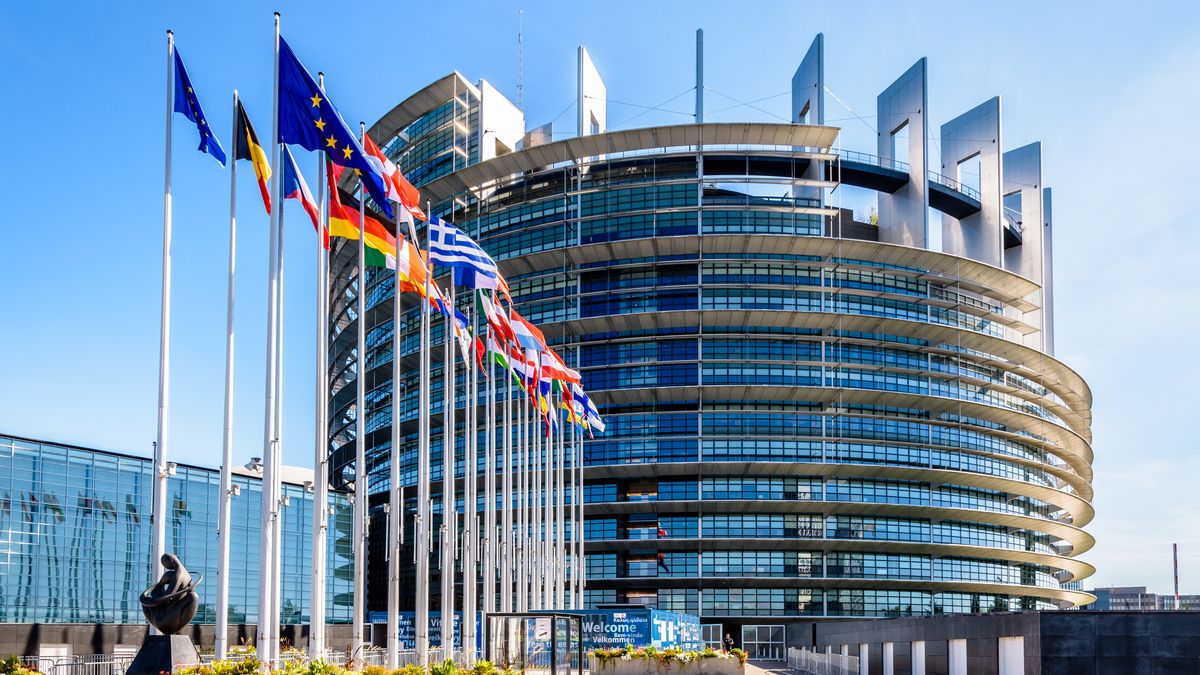 Entrance of the European Parliament building in Strasbourg, France.
Strasbourg, France - September 13, 2019: Entrance of the Louise Weiss building, inaugurated in 1999, the official seat of the European Parliament which houses the hemicycle for plenary sessions.
Olivier Rateau
Louise Weiss, building, parliament, european, Strasbourg, front view, general view, flag, flagpole, row, statue, sculpture, entrance, flying, blowing, wind, glass, tower, banner, european union, EU, Europe, France, landmark, institution, headquarters, office, seat, district, quarter, architecture, blue, sky, country, democracy, directive, election, exterior, french, legislation, member, nobody, official, parliamentary, politics, state, sunlight, sunny, sunshine, vote