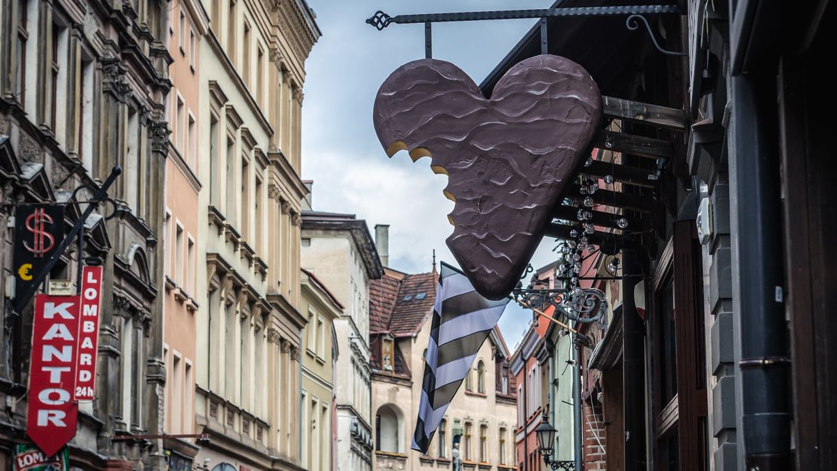 Torun, Poland - February 20, 2019: Gingerbread sign over the entrance of sweet shop in historic part of Torun
Torun, gingerbread, gingerbreads, Old Town, Old City, Poland, shop, store, sweet, sweets, Polish, city, urban, sign, signboard, travel, tourism, tourist attraction, travel destination, confectionery, confectioners, cake shop, landmark, building, famous, sightseeing, Kuyavian, Cuiavian, Pomeranian, Voivodeship, Province, Kujawsko Pomorskie, Kujawy Pomerania, Europe, old, historic, historical, history, Stare Miasto, UNESCO, World Heritage Site, torun, gingerbread, gingerbreads, old town, old city, poland, shop, store, sweet, sweets, polish, city, urban, sign, signboard, travel, tourism, tourist attraction, travel destination, confectionery, confectioners, cake shop, landmark, building, famous, sightseeing, kuyavian, cuiavian, pomeranian, voivodeship, province, kujawsko pomorskie, kujawy pomerania, europe, old, historic, historical, history, stare miasto, unesco, world heritage site