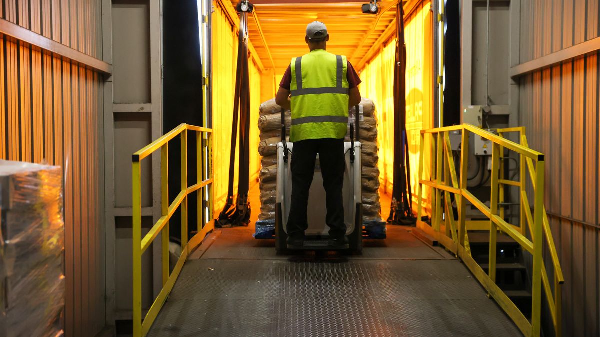 A worker loads a pallet of packed rice goods onto a truck at a warehouse at the Veetee Rice Ltd. facility in Rochester, UK, on Wednesday, Aug. 9, 2023. British rice millers such as Veetee Rice have thrived for decades by importing low-tariff unmilled brown rice from the likes of India and Pakistan and "polishing" the grains into the white product loved by UK consumers. Photographer: Hollie Adams/Bloomberg via Getty Images