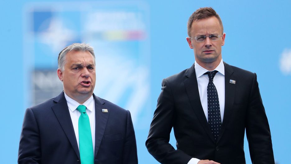 Meeting of NATO Heads of State and Government in Brusselsepa06882698 Hungary's Prime Minister Viktor Orban (L) and Hungary's Foreign Minister Peter Szijjarto arrive for the second day of a NATO summit in Brussels, Belgium, 12 July 2018. NATO countries' heads of states and governments gather in Brussels for a two-day meeting.  EPA/TATYANA ZENKOVICH / POOL Dostawca: PAP/EPA.TATYANA ZENKOVICH / POOL