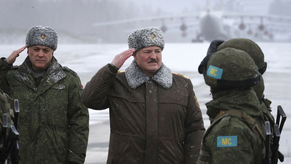 arch49Belarusian President Alexander Lukashenko, centre, greets peacekeepers of the Collective Security Treaty Organization after their withdrawal from Kazakhstan, on military airport near Minsk, Belarus, Saturday, Jan.15, 2022. In light of unprecedented mass protests that quickly grew violent, Kazakh President Kassym-Jomart Tokayev requested help from the Collective Security Treaty Organization, a Russia-led military alliance of six ex-Soviet states. The bloc sent over 2,000 troops to Kazakhstan last week, and on Tuesday Tokayev declared their mission largely complete. (Maxim Guchek/BelTA Pool Photo via AP)BelTA