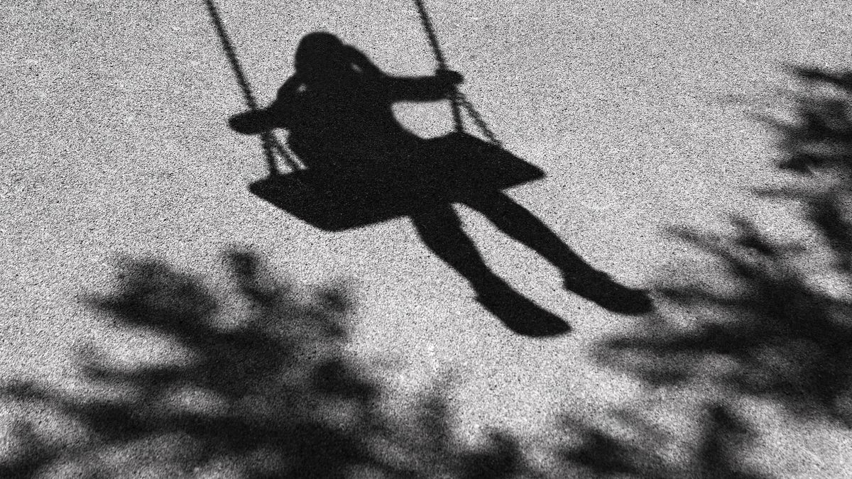Girl on a swing shadow
