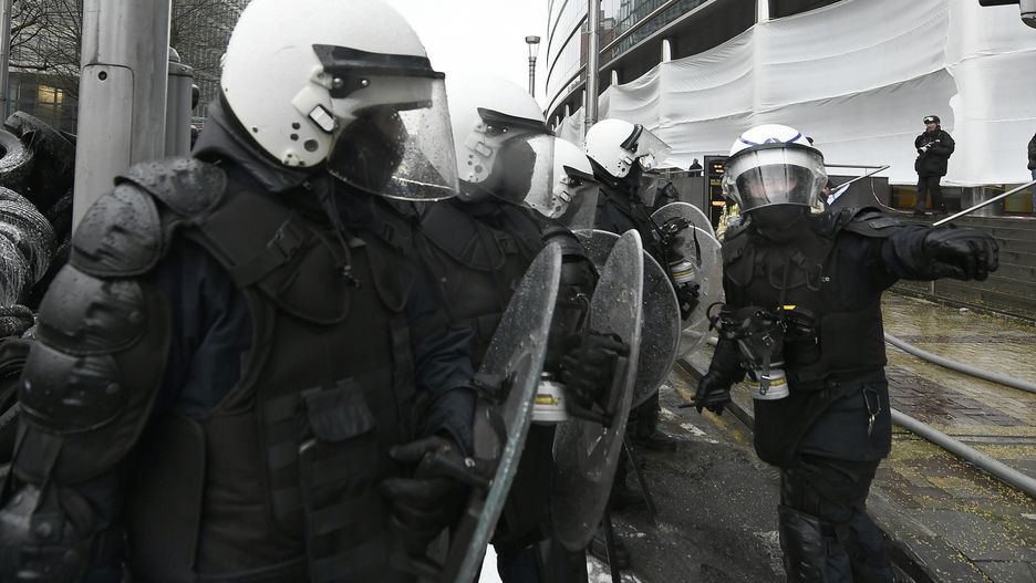 Belgian Farmers Block Rue De La Loi In Brussels With Tractor Convoy
BRUSSELS, BELGIUM - FEBRUARY 26: Policemen lined up in riot gear during the farmers protest near the buildings of the European Commission and the European Council on February 26, 2024 in Brussels, Belgium. Hundreds of Belgian farmers marched through Rue de la Loi towards the Schuman roundabout in Brussels, where EU agriculture ministers met today, blocking traffic with their tractors and setting fire to piles of tires in the latest in a series of European farmer protests. (Photo by Pier Marco Tacca/Getty Images)
Pier Marco Tacca