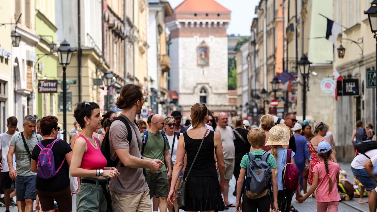 KRAKOW, MALOPOLSKIE, POLAND - 2024/07/11: People walk on Florianska street in summer clothes in an Old Town as a heat wave hits Krakow. The Polish Institute of Meteorology and Water Management has issued an Excessive Heat Warning, as temperatures over 30 Celsius degrees continue for a few days. (Photo by Dominika Zarzycka/SOPA Images/LightRocket via Getty Images)