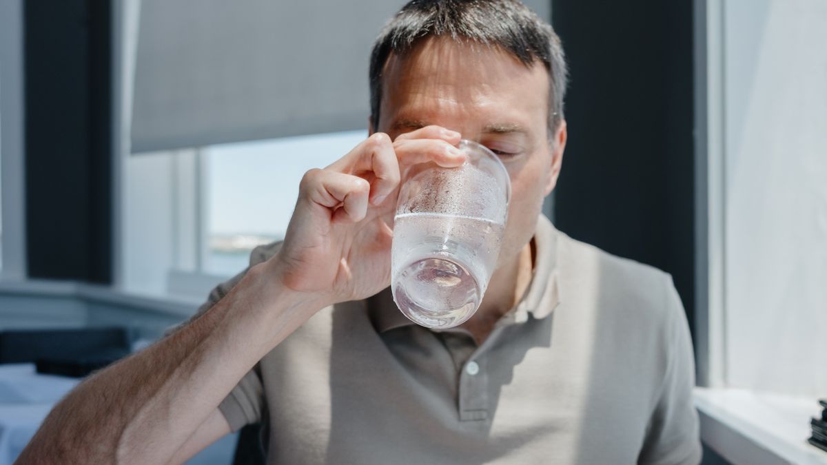Man Drinks Glass of Water at Restaurant
Close-up of mid adult man drinking glass of water at restaurant
Grace Cary