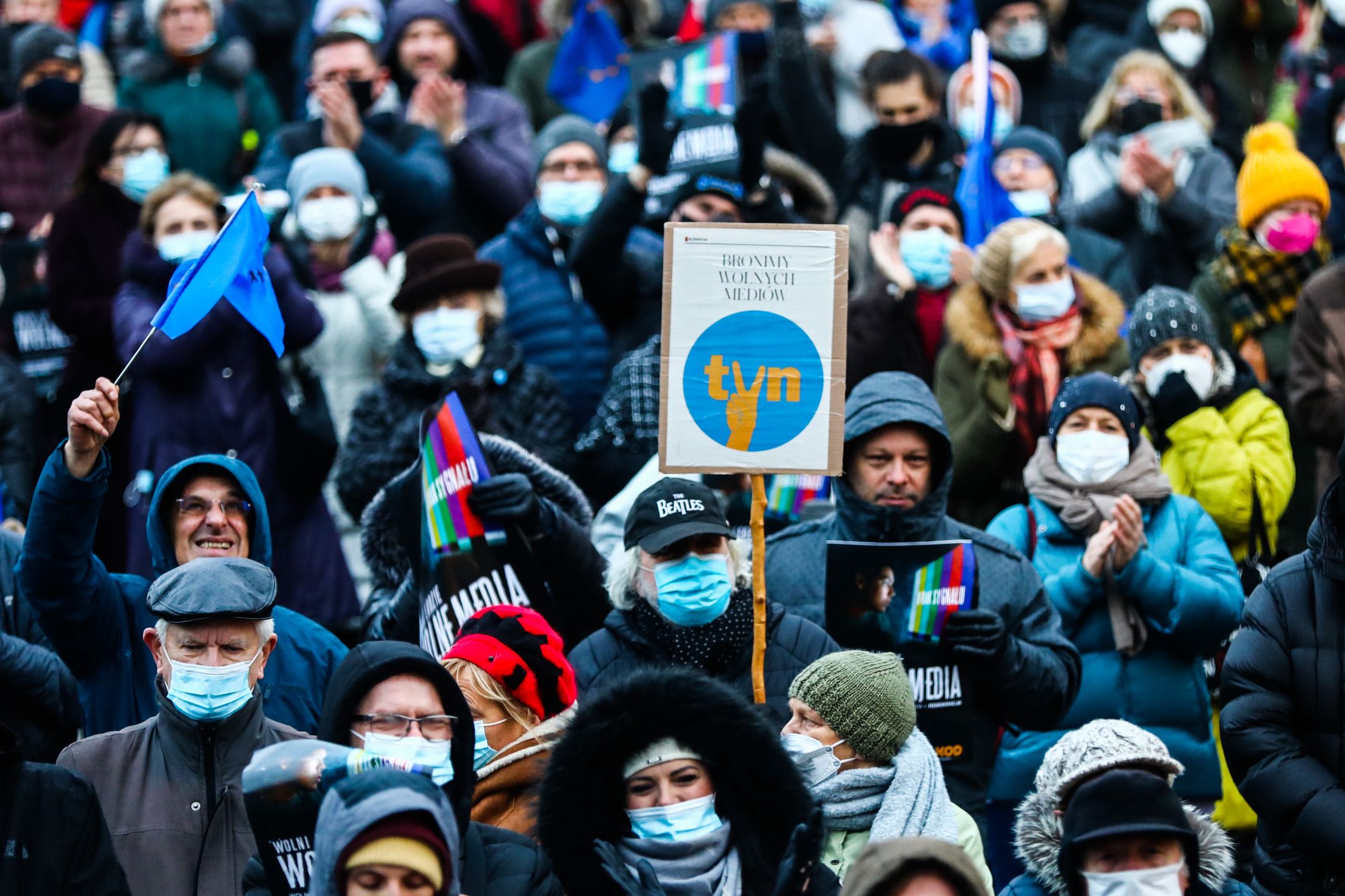 People attend 'Free People, Free Media' protest at the Main Square in Krakow, Poland on December 19, 2021. Protesters gathered after Poland's parliament, controlled by Law and Justice(PiS) party, voted unexpectedly in support of a controversial media reform bill targeting Discovery-owned TVN group channels. The bill now goes to President Andrzej Duda to be signed into law. (Photo by Beata Zawrzel/NurPhoto via Getty Images)
