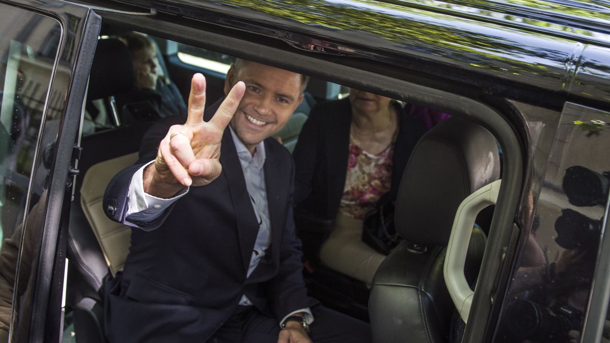 WARSAW, MASOVIAN VOIVODESHIP, POLAND - 2025/06/01: Karol Nawrocki (C), candidate for the 2025 Polish presidential election supported by Poland's right-wing Law and Justice (PiS) party leaves the polling station. Polling stations opened today (June 1) for a second round presidential election runoff between two candidates Rafal Trzaskowski and Karol Nawrocki. Opinion polls have predicted an extremely close race with nationalist historian Karol Nawrocki supported by the right-wing Law, Justice party (PiS) and pro-EU Warsaw Mayor Rafal Trzaskowski neck and neck ahead of the vote. (Photo by Attila Husejnow/SOPA Images/LightRocket via Getty Images)