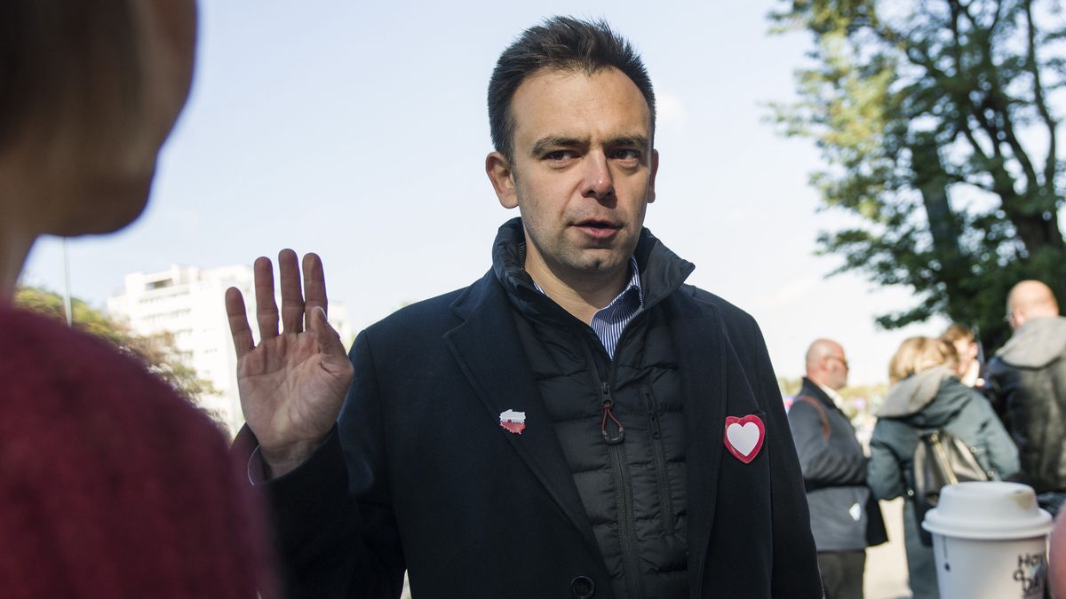 WARSAW, MAZOWIECKIE, POLAND - 2023/10/10: Andrzej Domanski speaks with passers-by outside the Warsaw School of Economics. Outside the Warsaw School of Economics, a press conference was held of the two candidates for MP of the Civic Platform - Civic Coalition (PO, KO) in the upcoming parliamentary election (October 15), Aleksandra Gajewska and Andrzej Domanski. The topic of the press conference was the election proposals of the Civic Coalition for students and young voters. After the conference, A. Gajewska and A. Domanski encouraged students and passers-by to participate in the parliamentary elections. (Photo by Attila Husejnow/SOPA Images/LightRocket via Getty Images)