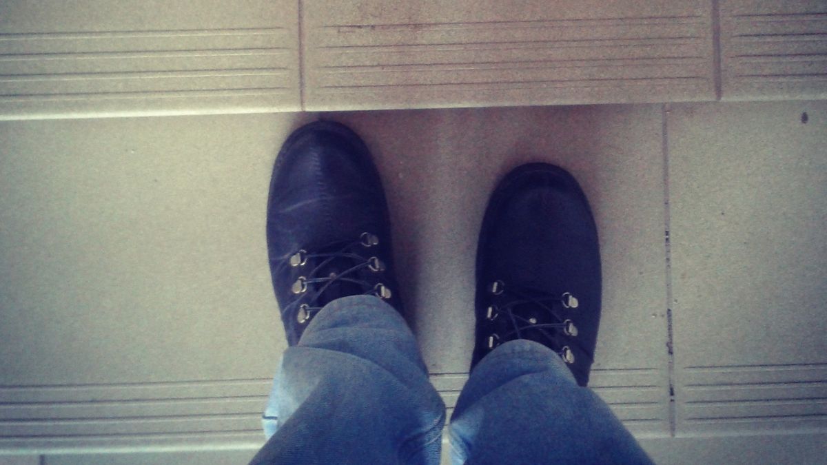 Feet on the stairs.Photographed with mobile phone.StraitelBlue, Boot, Brown, Cobblestone, Color Image, Copy Space, Day, Directly Above, Environment, Floor, Freshness, High Angle View, Human Foot, Human Leg, Ideas, Jeans, Looking Down, Men, MobileStock, Multi Colored, Outdoors, People Traveling, Personal Perspective, Shoe, Sidewalk, Square, Staircase, Standing, Steps, Stone, Summer, Toned Image, Travel, Unrecognizable Person, Waiting, Walking