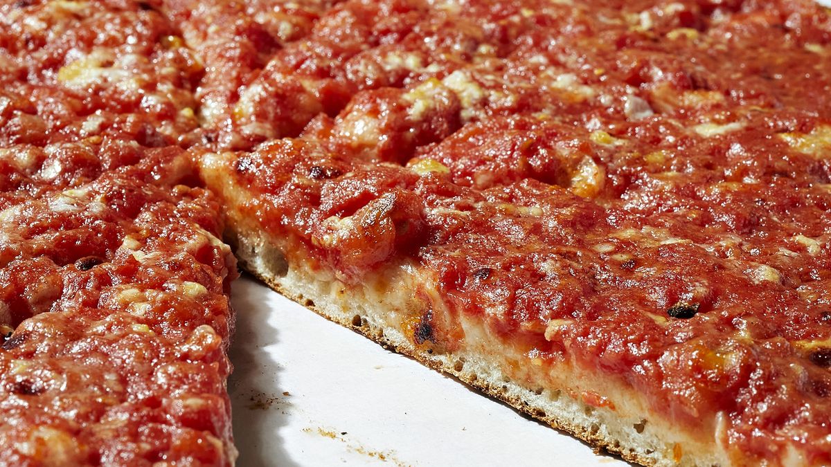 BETHESDA, MD - JUNE 1: The Original Tomato Pie - crushed Italian tomatoes, grated Pecorino Romano and olive oil photographed at Frank Pepe Pizzeria Napoletana in Bethesda, Maryland on June 1, 2022. (Photo by Deb Lindsey for The Washington Post via Getty Images).