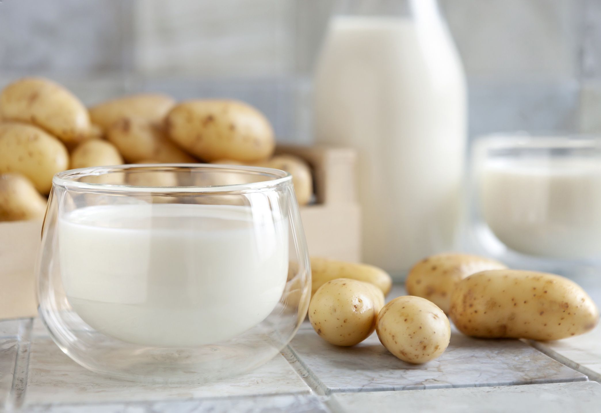 Vegan potato milk in glass and potato on ceramic tile background
Vegan potato milk in glass and potato on ceramic tile background. Plant based milk replacer, lactose free concept. Selective focus, close up
Eleonora Grigorjeva / 500px
potato milk, alternative, vegan-friendly, non-dairy milk, plant-based, potato drink, energy, fresh, natural, alimentary, vegetarian, healthy, beverage, sustainable, nut free, soy free, environment friendly, nutritious, potatoes, powder, creamy, option, allergs-free, background, close up