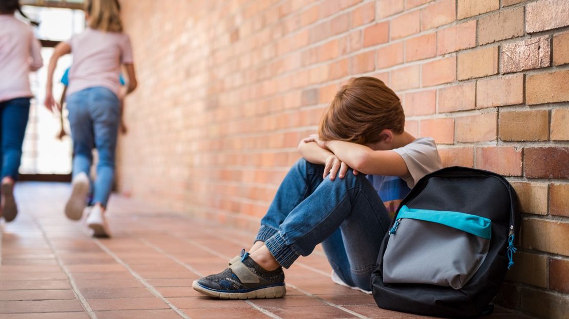 Little boy sitting alone on floor after suffering an act of bullying while children run in the background. Sad young schoolboy sitting on corridor with hands on knees and head between his legs.
bullying,bully,school,issue,child,crying,sad,boy,elementary,upset,abuse,primary,sitting,young,bad,lonely,depression,unhappy,depressed,kid,cry,childhood,grief,schoolboy,student,troubled,sadness,negative,pupil,classmate,mate,education,frustration,solitude,bullied,problem,abused