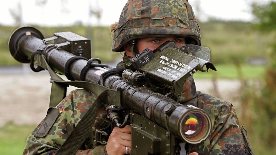 German navy evacuation training(dpa) - A soldier of the German Air Force object protection battalion holds the practice version of a Stinger anti aircraft missile during an evacuation training excercise of civilians out of an imaginary dangerous area at the German naval base Wilhelmshaven, Germany, 23 September 2004. The large scale training exercise marked the end of a joint four-week-long exercise of the Geman and Danish navy.A2942 Ingo Wagnermilitary, soldier, rocket launcher, weapon, arms