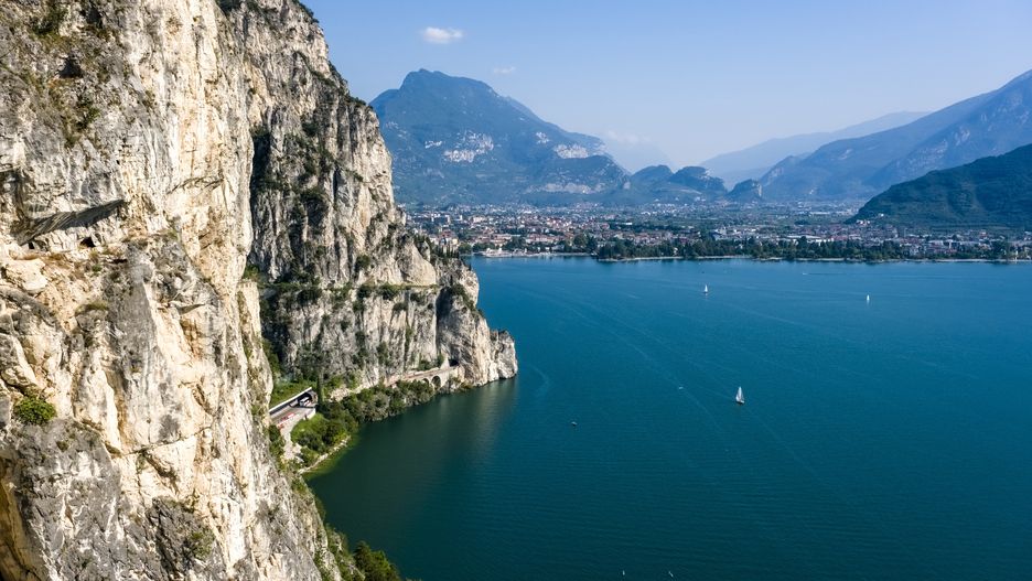 RIVA DEL GARDA, TRENTINO-ALTO ADIGE, ITALY - 2023/09/09: View on Riva del Garda, seen from the spectacular Ciclovia del Garda cycle path that will run around Lake Garda in the future. (Photo by Frank Bienewald/LightRocket via Getty Images)