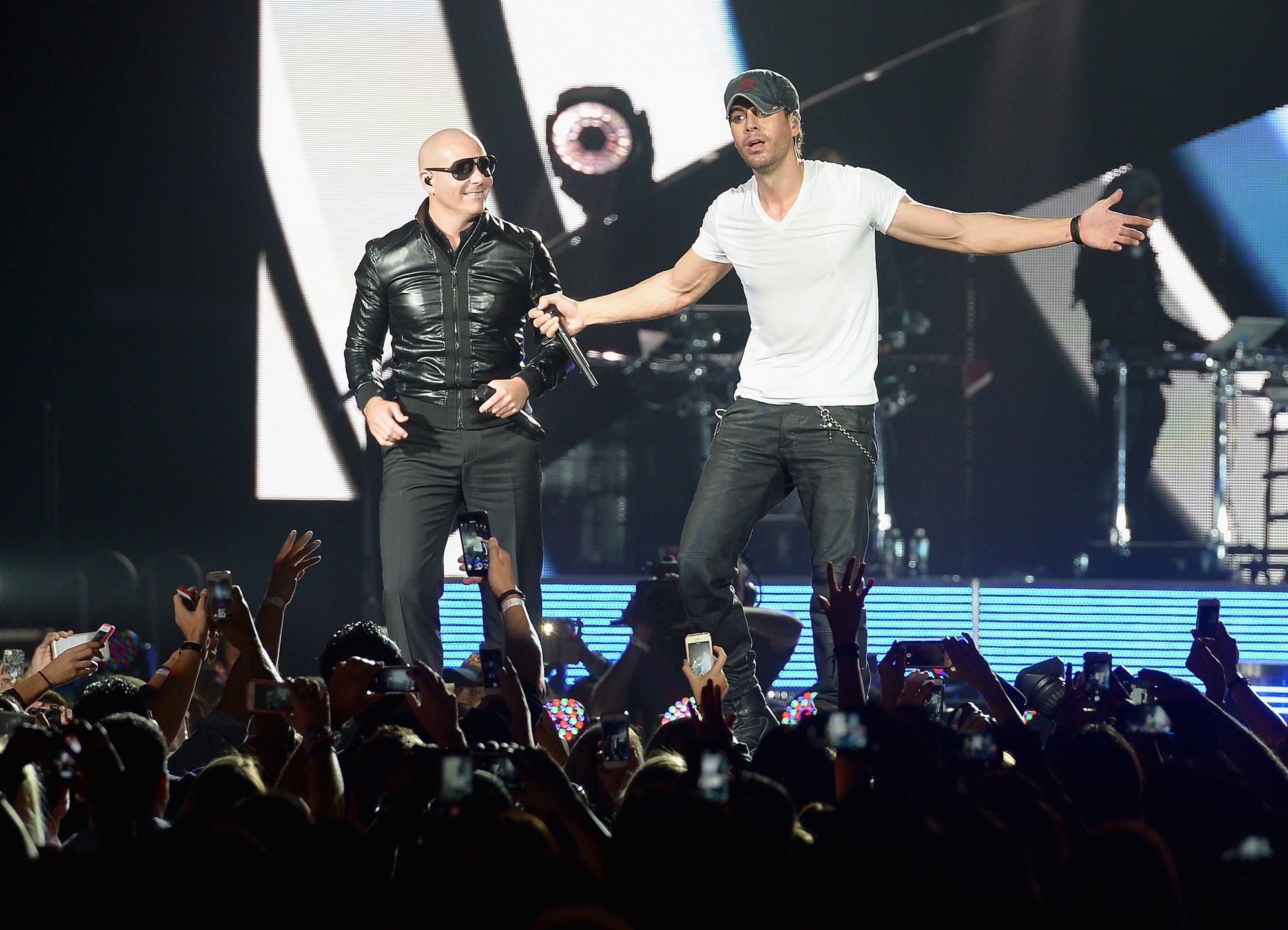 Enrique Iglesias and Pitbull Perform At American Airlines ArenaMIAMI, FL - OCTOBER 26:  Pitbull and Enrique Iglesias perform at American Airlines Arena on October 26, 2014 in Miami, Florida.  (Photo by Gustavo Caballero/Getty Images)Gustavo CaballeroCelebrities, Music