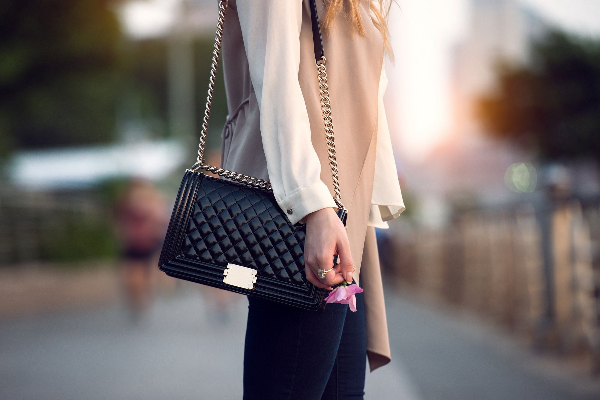 Close up of stylish female black leather bag outdoors. Fashionable and luxury style expensive female bag.Nikita Starichenkowww.nik-star.cbag, woman, fashion, handbag, outfit, women, street, black, female, model, girl, watch, purse, leather, beautiful, style, shopping, stylish, luxury, fashionable, autumn, accessories, elegant, people, city, young, casual, sweater, clothing, outdoor, candid, person, closeup, holding, elegance, clutch, white, hand, pretty, business, lady, clothes, walking, caucasian, outfiit, smart, bag, woman, fashion, handbag, outfit, women, street, black, female, model, girl, watch, purse, leather, beautiful, style, shopping, stylish, luxury, fashionable, autumn, accessories, elegant, people, city, young, casual, sweater, clothing, outdoor, candid, person, closeup, holding, elegance, clutch, white, hand, pretty, business, lady, clothes, walking, caucasian, outfiit, smart