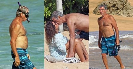 67-letni Pierce Brosnan pluska się w oceanie i wymienia czułości z żoną na hawajskiej plaży (ZDJĘCIA)