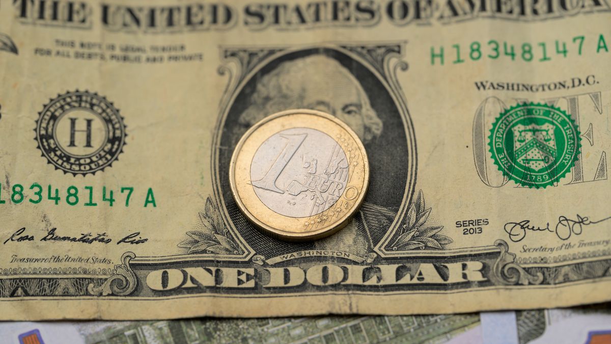 The US one dollar bill lies beside the EU 1 EURO coin in this photo illustration in Brussels, Belgium, on January 4, 2025. (Photo by Jonathan Raa/NurPhoto via Getty Images)