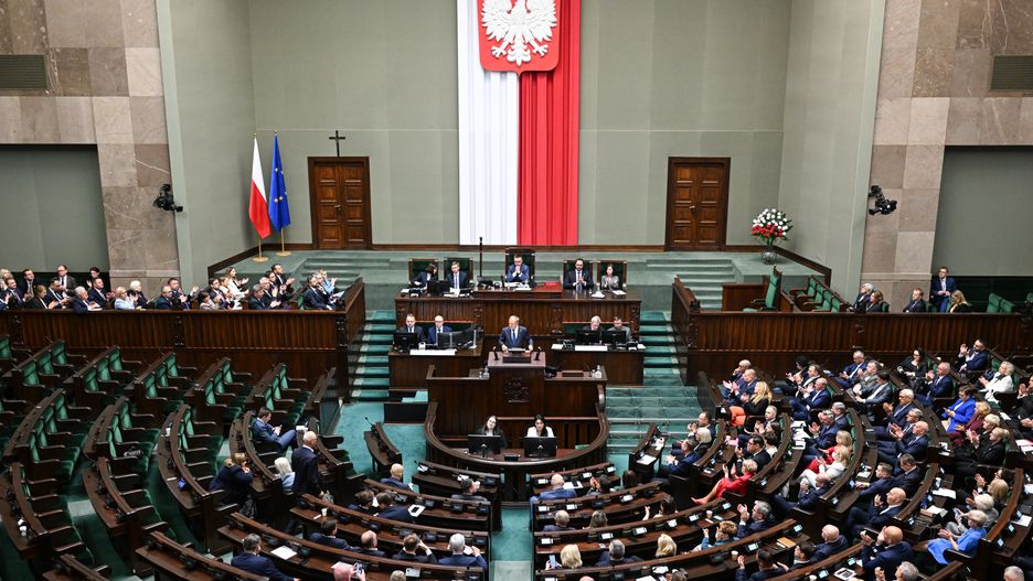WARSAW, POLAND - JUNE 11:  Poland's Prime Minister delivers a speech resuming the government achivements hours before a vote of confidence  at the SEJM in Warsaw, Poland on June 11, 2025. The vote comes after Rafal Trzaskowski from Tusk's Civic Coalition was defeated by nationalist Karol Nawrocki in the Presidential elections. (Photo by Omar Marques/Anadolu via Getty Images)