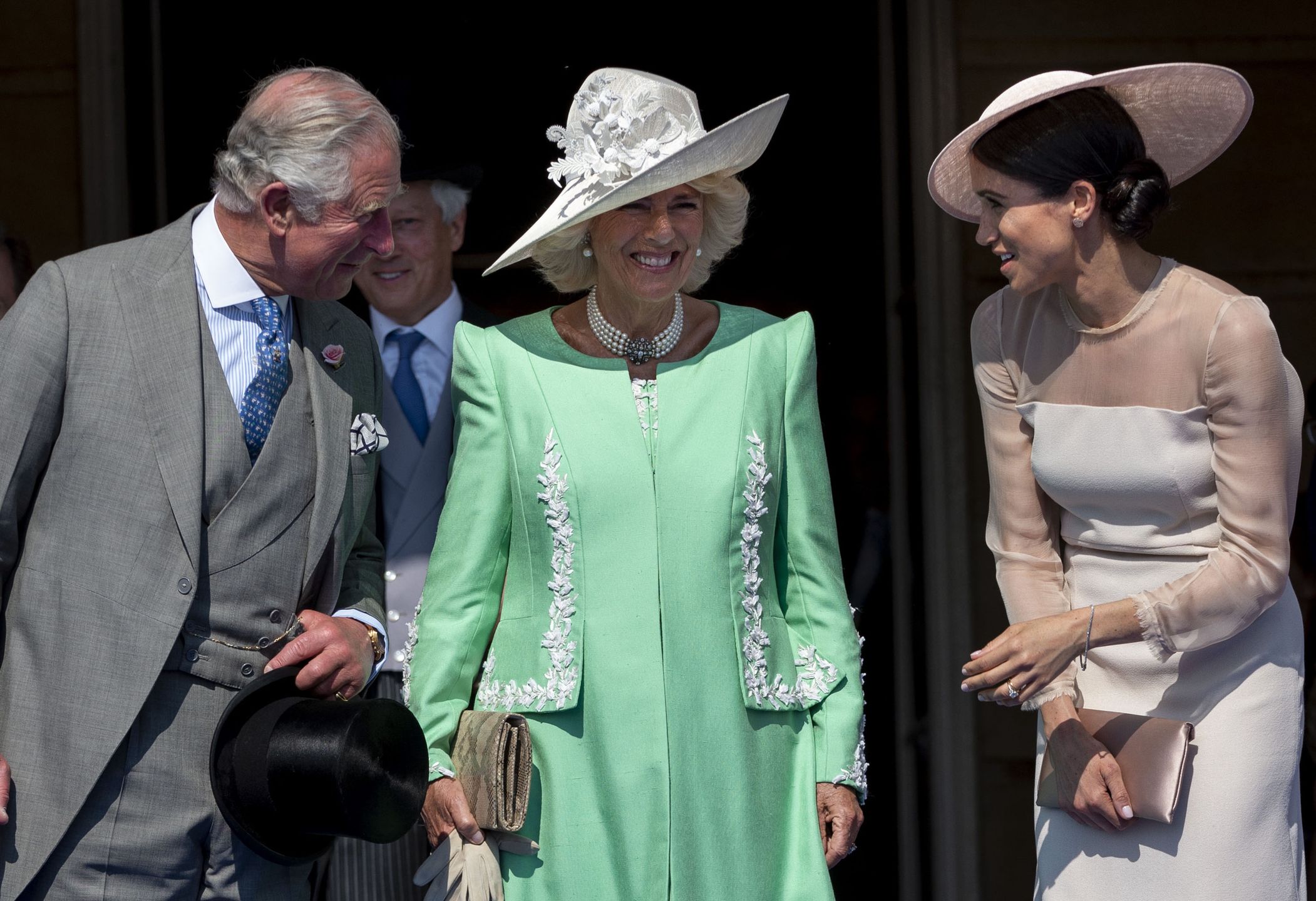 Król Karol III, królowa małżonka i Meghan Markle