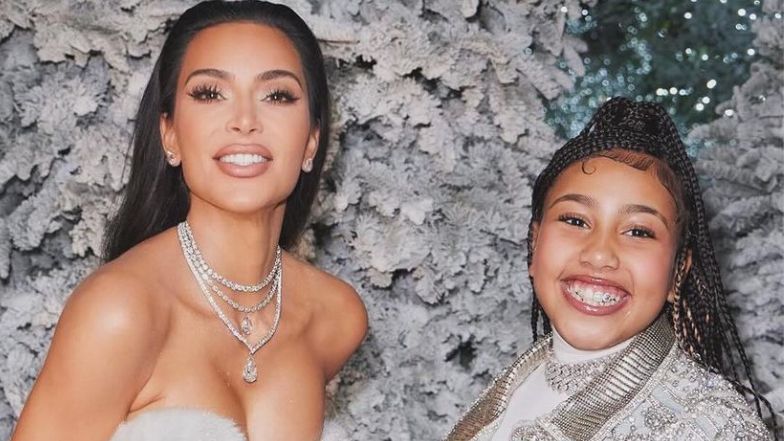 Kim Kardashian's holiday photo raises brows: a photoshop glitch or a case of two thumbs?