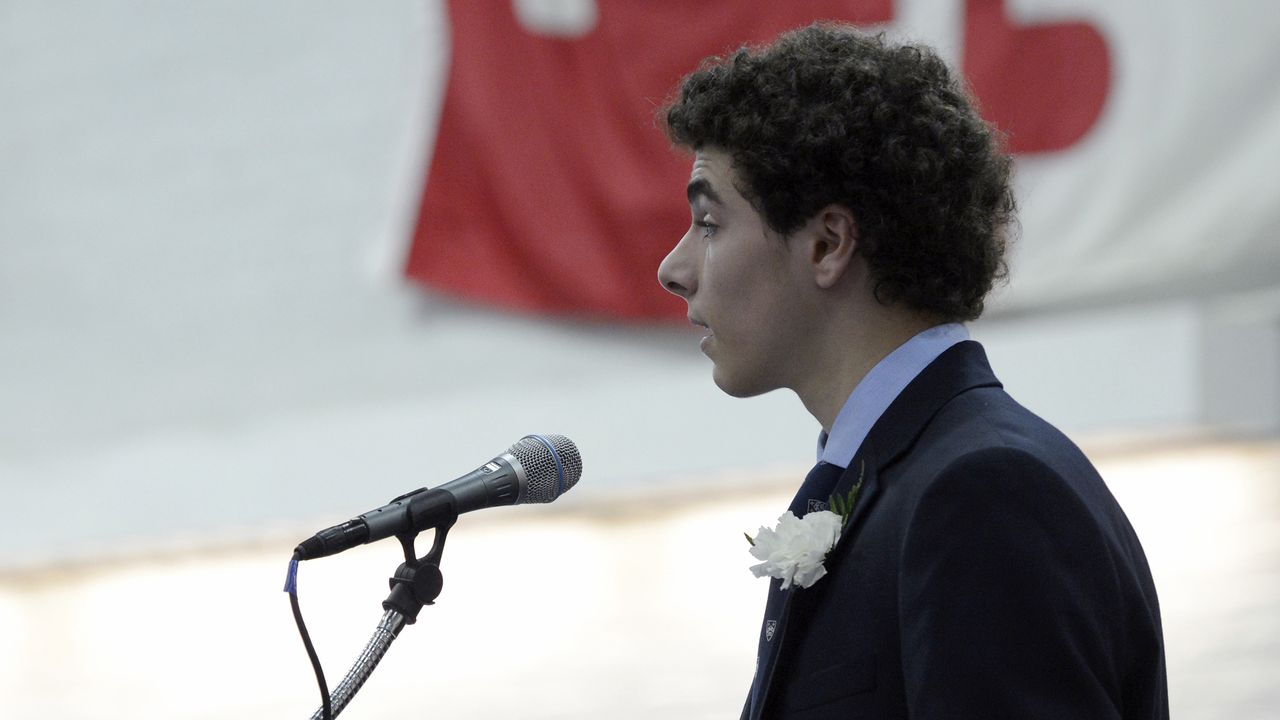 Valedictorian Luigi Mangione gives a farewell speech to the Class of 2016 during commencement at Gilman School. (Nicole Munchel/The Baltimore Sun/Tribune News Service via Getty Images)