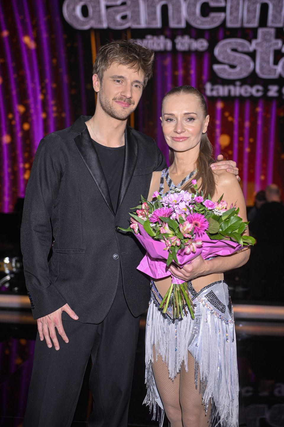 Maciej Musiał z mamą