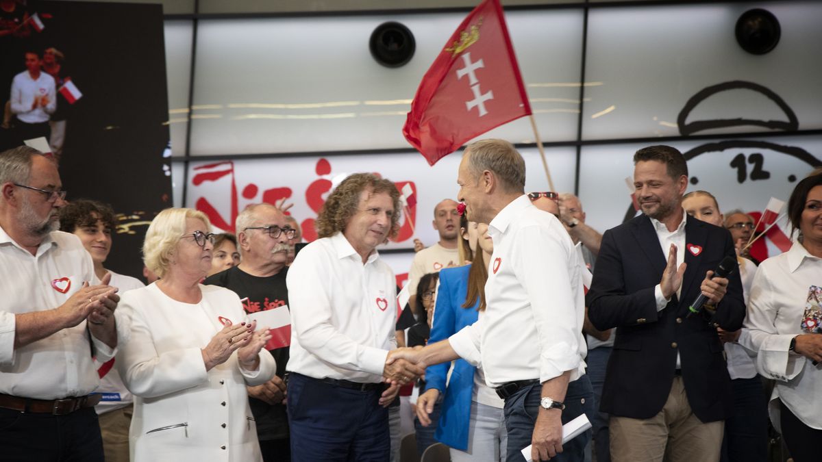 GDANSK, POLAND - 2023/09/01: Donald Tusk greets Mayor of Sopot Jacek Karnowski during the Civic Platform (PO) party election rally. The former Prime Minister of Poland and current leader of the Civic Platform (PO) party, Donald Tusk, and his party members hold an election rally at the European Solidarity Centre in Gdansk. Civic Platform is a center-right political party in Poland. The rally was held on the day of the 43rd anniversary of the August agreement, which the former Prime Minister recalled in his speech . Civic Platform party members namely, Aleksandra Dulkiewicz, Mayor of Gdansk, Piotr Adamowicz, Henryka Krzywonos-Strycharska, and Rafa Trzaskowski, Mayor of Warsaw, delivered speeches during the rally. (Photo by Agnieszka Pazdykiewicz/SOPA Images/LightRocket via Getty Images)