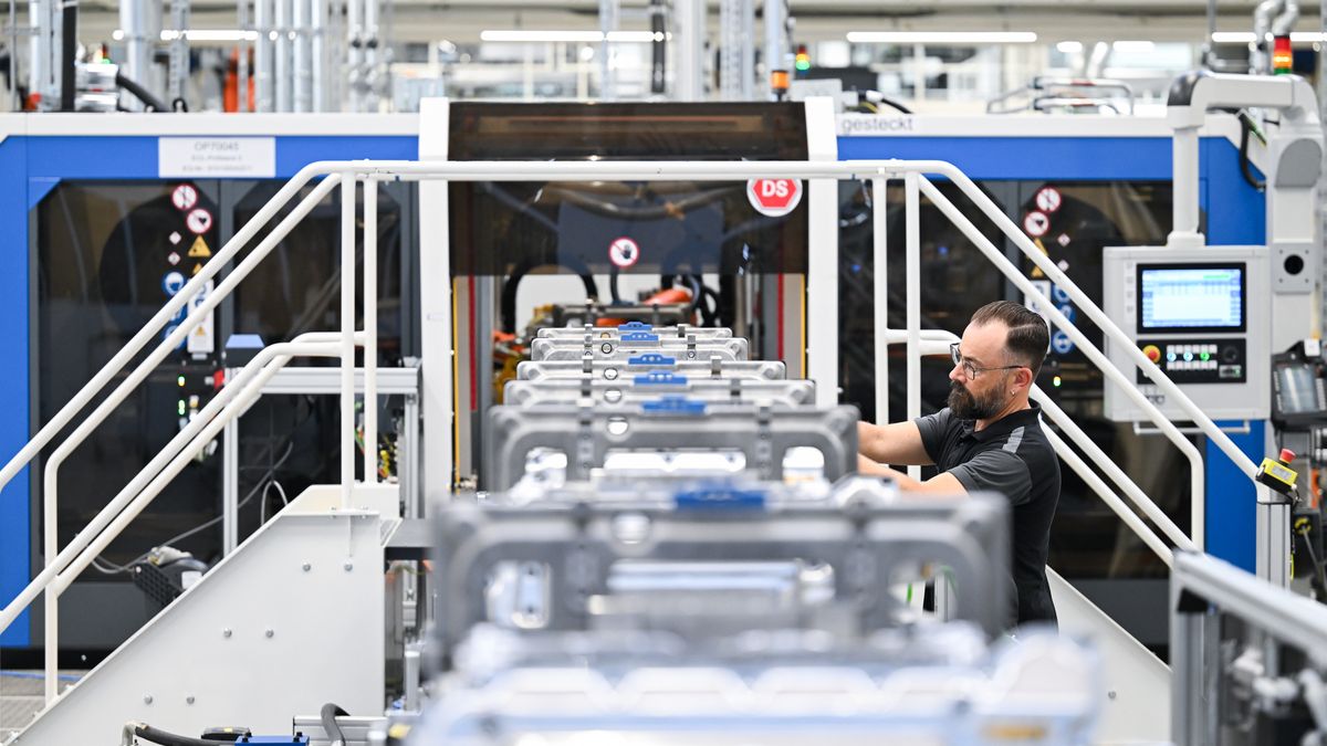 STUTTGART, GERMANY - JUNE 30: A worker assembles electric drive units for its CLA class electric vehicles at the Mercedes-Benz Untertuerkheim plant on June 30, 2025 in Stuttgart, Germany. (Photo by Florian Wiegand/Getty Images)
