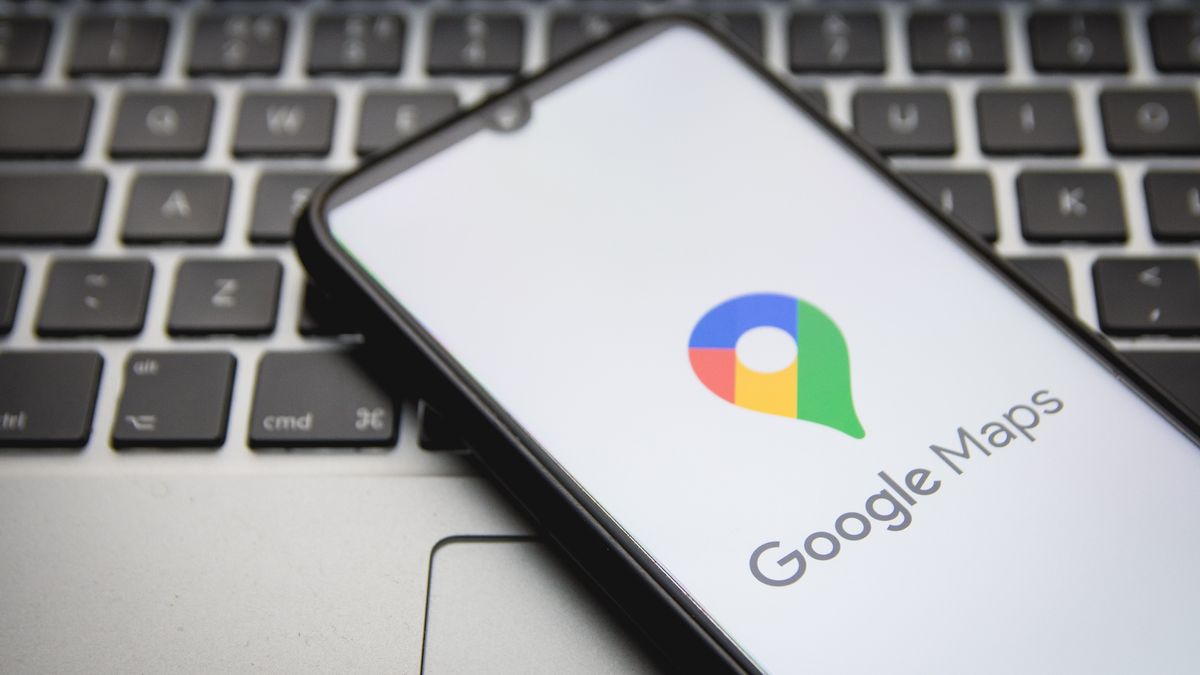 In this photo illustration a Google Maps logo seen displayed on a smartphone screen with a computer keyword in the background in Athens, Greece on December 16, 2021. (Photo by Nikolas Kokovlis/NurPhoto via Getty Images)