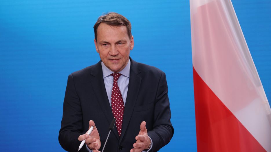 BERLIN, GERMANY - JANUARY 30: Polish Foreign Minister Radoslaw Sikorski speaks to the media during talks with German Foreign Minister Annalena Baerbock at the Foreign Ministry on January 30, 2024 in Berlin, Germany. The two leaders discussed, among other issues, European military aid to Ukraine. (Photo by Sean Gallup/Getty Images)