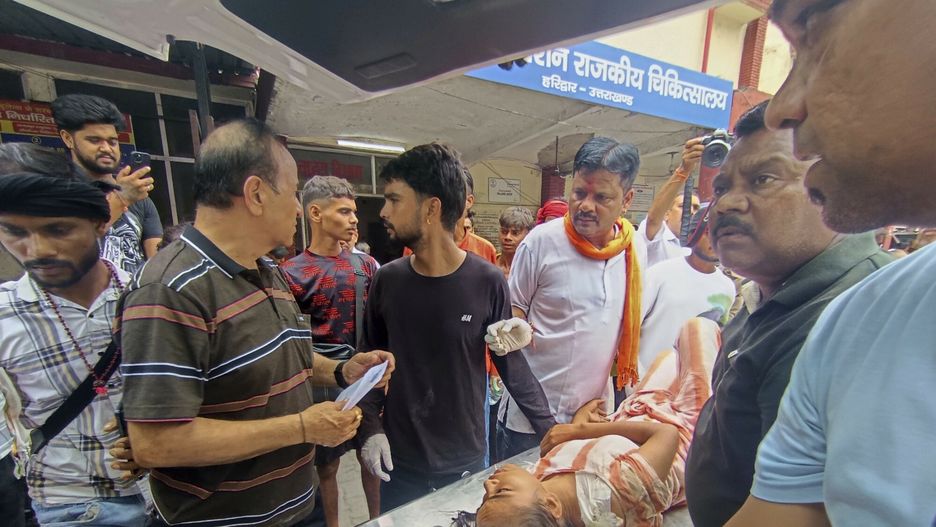 Temporary
An injured from temple stampede is carried inside a hospital in Haridwar, India, Sunday, July 27, 2025. (AP Photo)