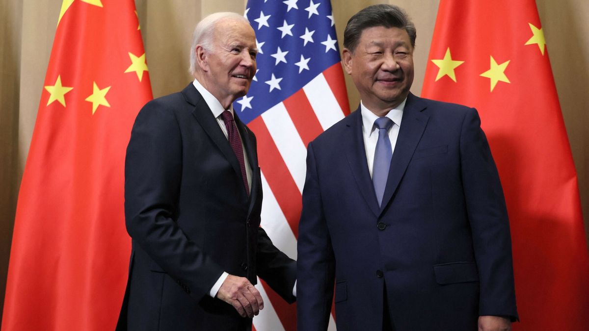 Temporary
US President Joe Biden (L) speaks with Chinese President Xi Jinping on the sidelines of the Asia-Pacific Economic Cooperation (APEC) summit in Lima, Peru, November 16, 2024. (Photo by Leah Millis / POOL / AFP)
LEAH MILLIS