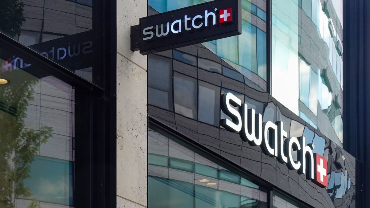 Swatch store signage is on a store building facade in Duesseldorf, North Rhine-Westphalia, Germany, on July 30, 2025. (Photo by Michael Nguyen/NurPhoto via Getty Images)