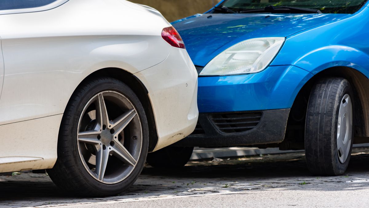 Bad parking decision
White luxurious car parked in front of a blue vehicle with a small space to get out of parking
Madrolly