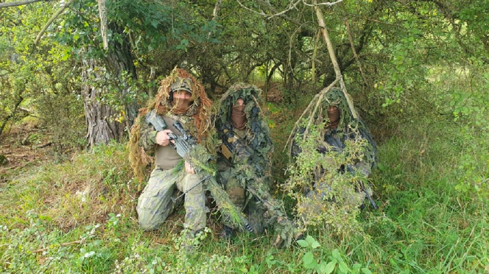 A team of Finnish snipers. The one in the middle has a SAKO TRG M10 rifle, and his comrades have older models from the TRG family.