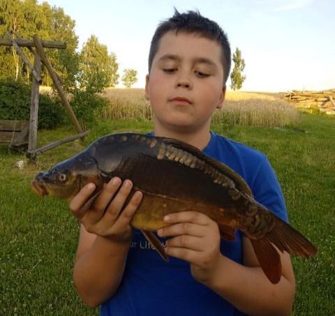 Michał ze złowionym Karpiem niedługo przed wypadkiem 