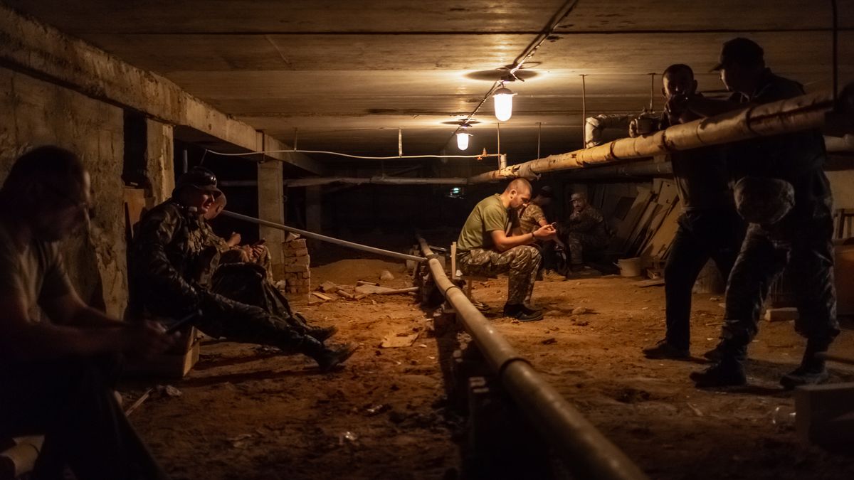 Volunteers of 206th battalion territorial defence arrived from Kiev, are seen in a shelter during a bomb alarm, in a shelter of the base located somewhere between Mykolaiv and Kherson, Ukraine, 2022-05-30. (Photo by Matteo Placucci/NurPhoto via Getty Images)
