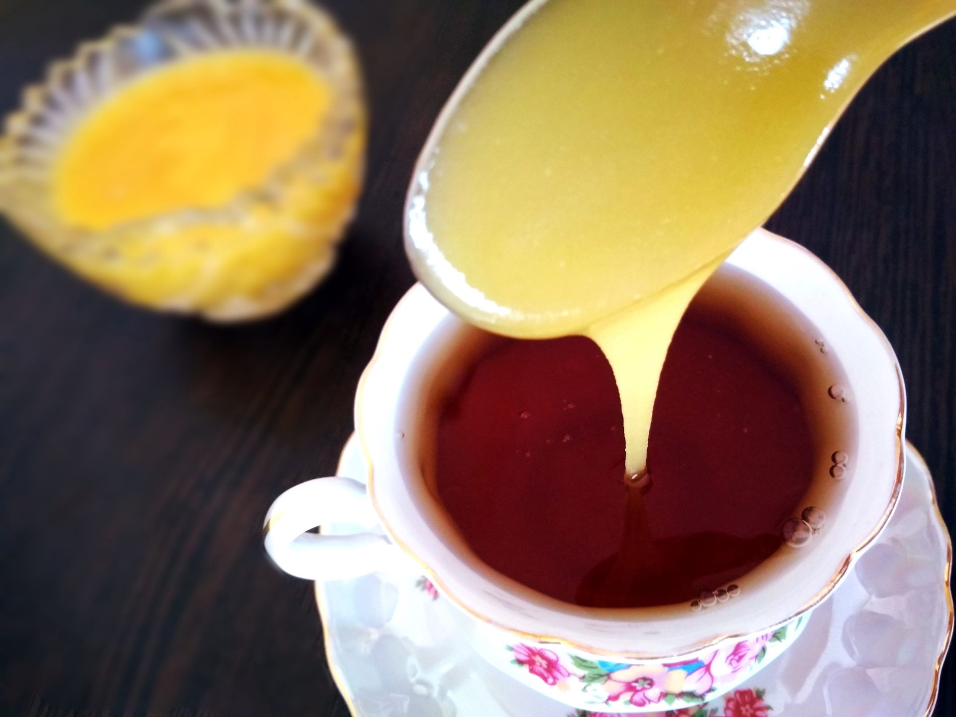 Tea with honey
In a beautiful porcelain Cup with tea on a saucer pour honey. In the background, a vase of honey on a blurred background.
Anna Lomovtseva