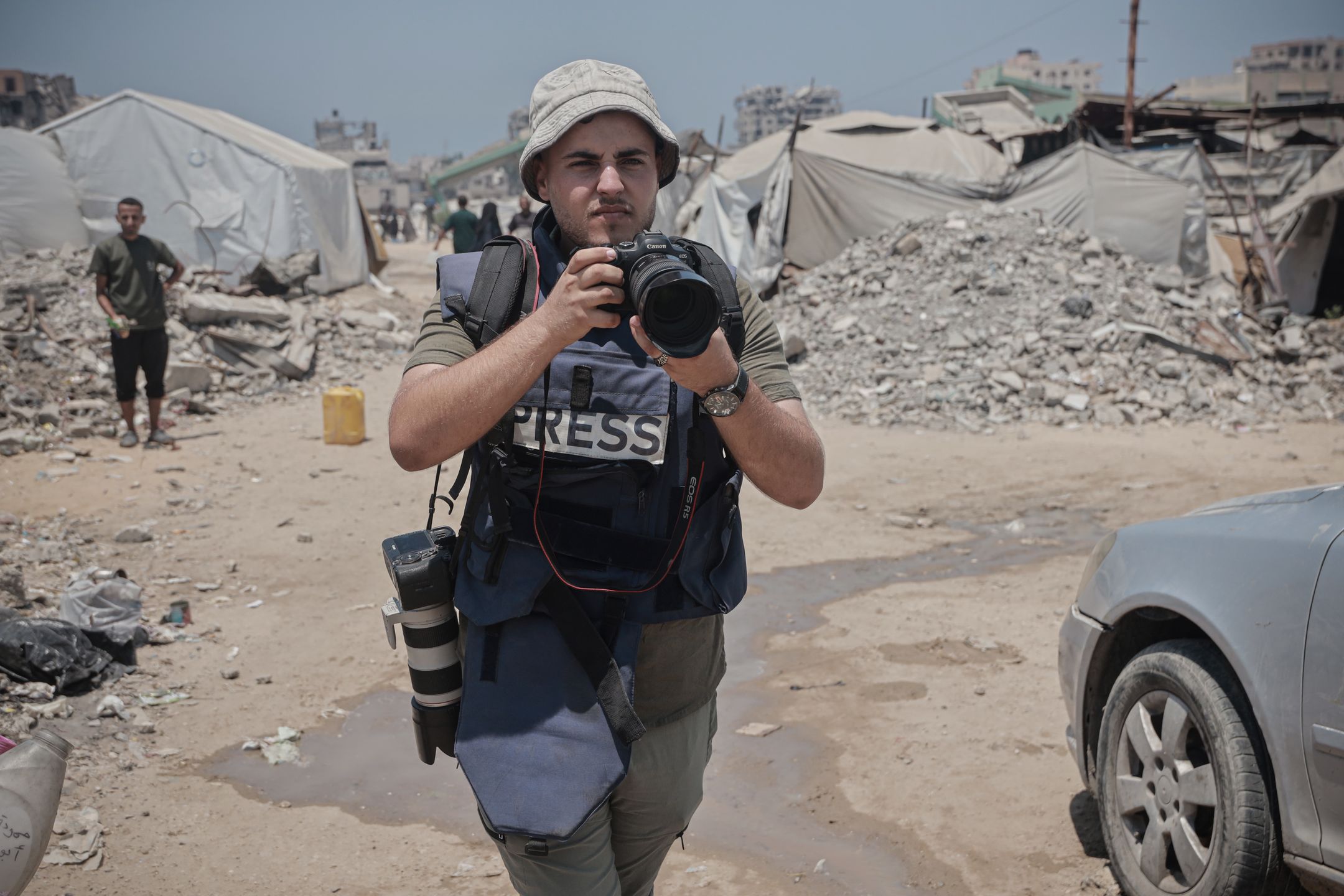 Ahmed Al-Arini w trakcie pracy w Gazie. Zdjęcie z 25 lipca 2025