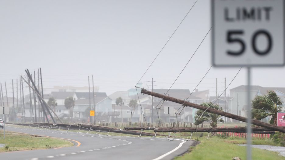 GALVESTON, TEXAS - JULY 8: Fallen power lines on Termini San Louis Pass Road on Galveston Island as a result of Hurricane Beryl on Monday, July 8, 2024. (Elizabeth Conley/Houston Chronicle via Getty Images)