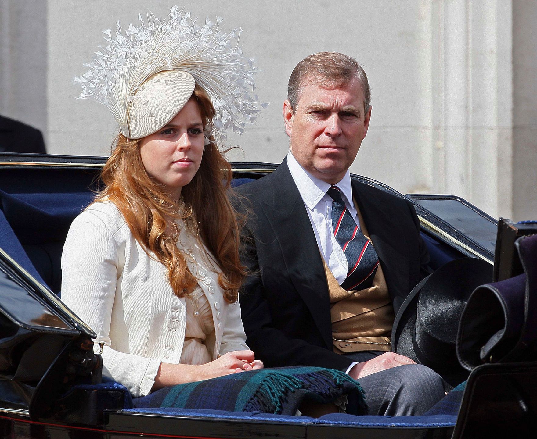 LONDON - JUNE 16:  Prince Andrew sits next to Princess Beatrice during the Trooping the Colour ceremony on June 16, 2007 in London. Each year the official birthday of Queen Elizabeth II is commemorated with a military parade and march-past of fully trained, operational troops from the Household Division.  (Photo by Peter Macdiarmid/Getty Images) *** Local Caption *** Prince Andrew;Princess Beatrice 