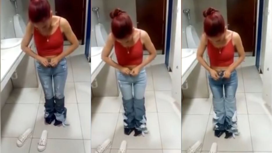 Kobieta na filmiku zdejmuje spodnie z siebie.