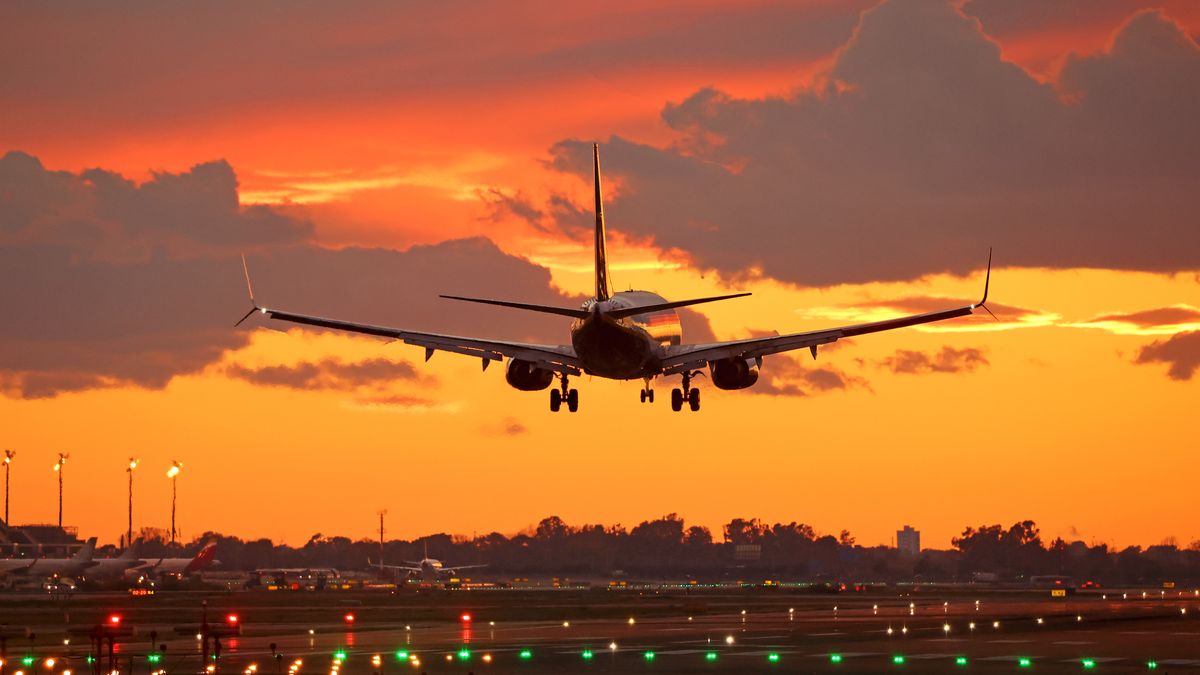 A Ryanair Boeing 737-8AS lands at Barcelona-El Prat Airport at sunset, in Barcelona, Spain, on November 20, 2025. (Photo by Joan Valls/Urbanandsport/NurPhoto via Getty Images)
